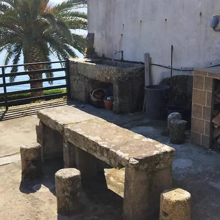 O Almacen * פיניסטרה